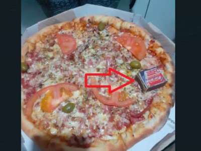 Cliente no Caiobá recebe pizza com caixa de fósforo de 