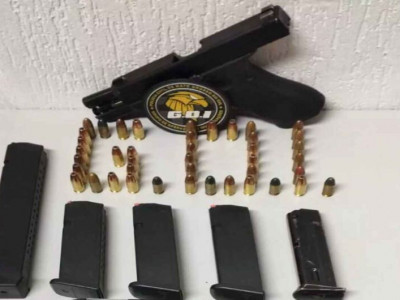 Sócio de bar é preso com pistola e porte de arma falsificado 