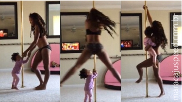 Mulher causa polêmica ao praticar pole dance com filha de 2 anos  