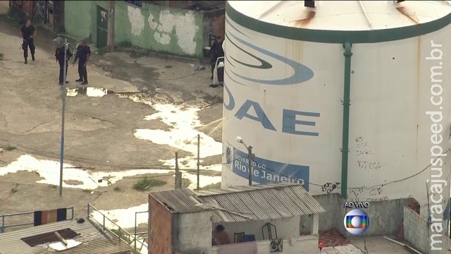 Troca de tiros deixa mortos e fura reservatório em comunidade Troca de tiros deixa mortos e fura reservatório em comunidade