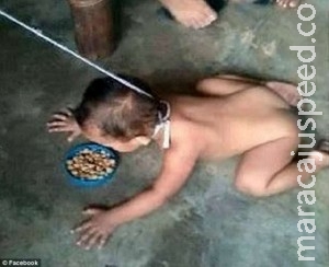 Mãe é detida por foto de bebê comendo no chão de coleira Mãe é detida por foto de bebê comendo no chão de coleira