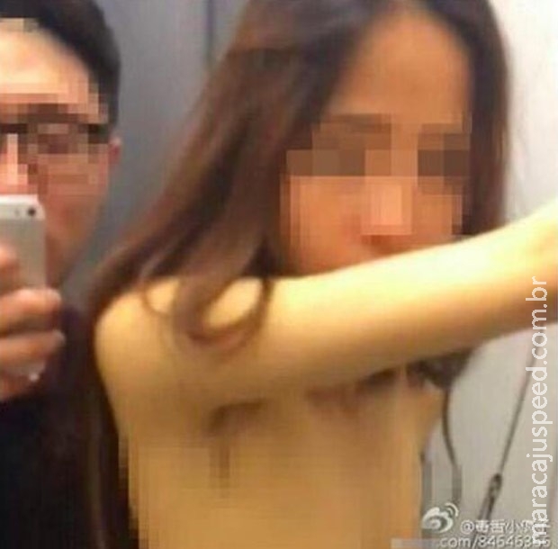 Casal cria polêmica ao fazer sexo em provador de roupas de loja na China Casal cria polêmica ao fazer sexo em provador de roupas de loja na China