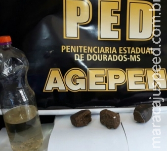 Agentes apreendem maconha e bebida artesanal na Penitenciária de Dourados Agentes apreendem maconha e bebida artesanal na Penitenciária de Dourados