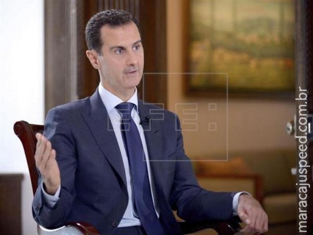 Al-Assad diz que guerra na Síria é culpa das diferenças entre Rússia e EUA Al-Assad diz que guerra na Síria é culpa das diferenças entre Rússia e EUA