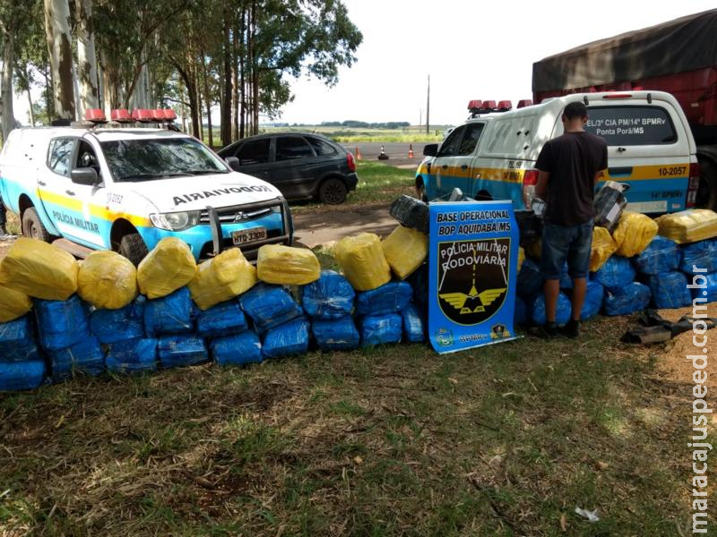 PMR apreende 1,345 toneladas de maconha escondida em carga de grãos de milho na região de fronteira. Autor afirmou ter carregado carga em Maracaju PMR apreende 1,345 toneladas de maconha escondida em carga de grãos de milho na região de fronteira. Autor afirmou ter carregado carga em Maracaju