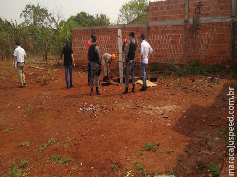 Corpos de pai e filho são encontrados carbonizados dentro de poço desativado