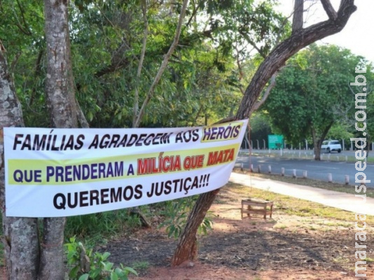 Faixas parabenizam Polícia e Justiça por prisão da “milícia que mata”