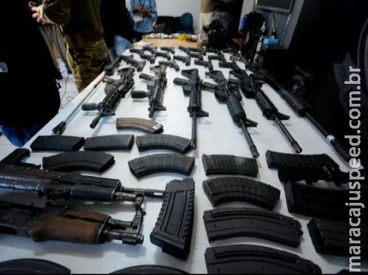 Acusados de milícia põem culpa em foragido Acusados de milícia põem culpa em foragido