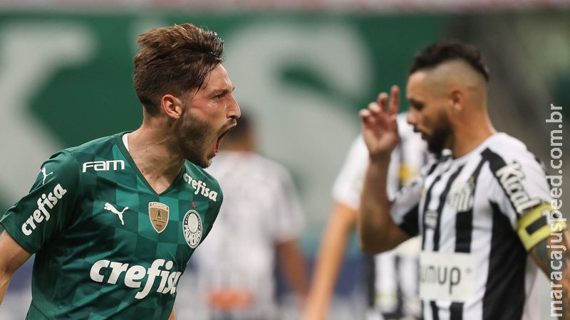 Palmeiras vence clássico, elimina Santos e mantém chances de avançar no Paulistão Palmeiras vence clássico, elimina Santos e mantém chances de avançar no Paulistão