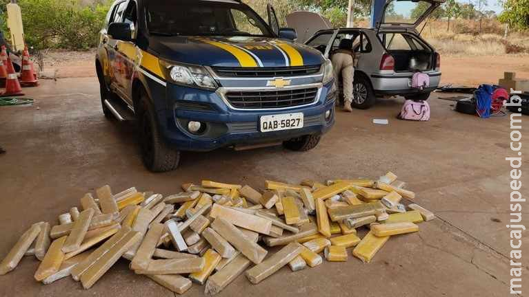 Casal é preso em Água Clara com 103,5 quilos de maconha em assoalho, forro e estepe de Gol