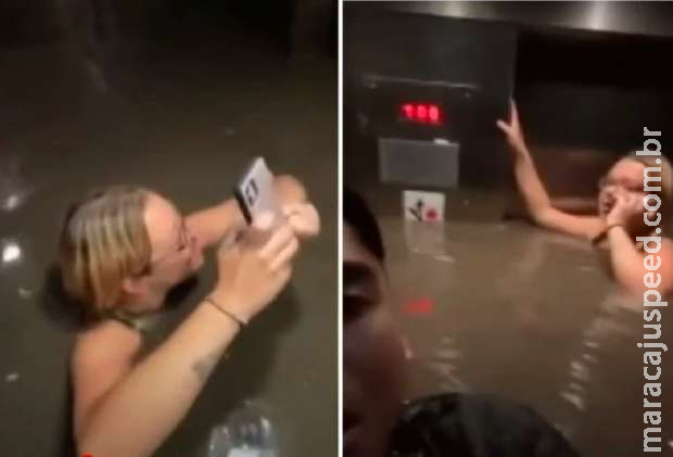 Grupo fica preso em elevador e com água até o pescoço Grupo fica preso em elevador e com água até o pescoço