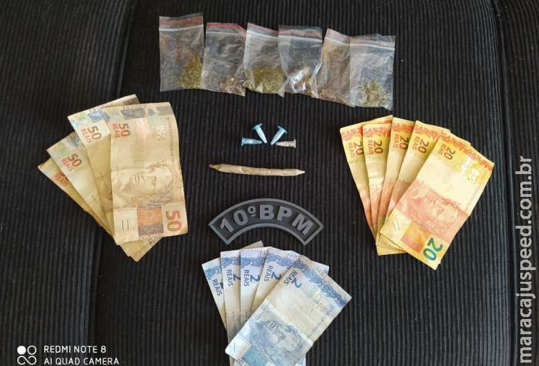 Após tentativa de fuga, dupla é presa com drogas e dinheiro Após tentativa de fuga, dupla é presa com drogas e dinheiro