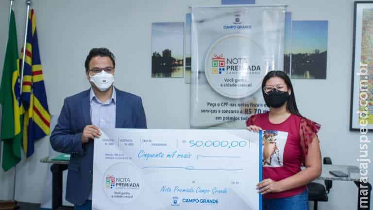 Sorteados recebem prêmios da Nota Premiada em Campo Grande Sorteados recebem prêmios da Nota Premiada em Campo Grande