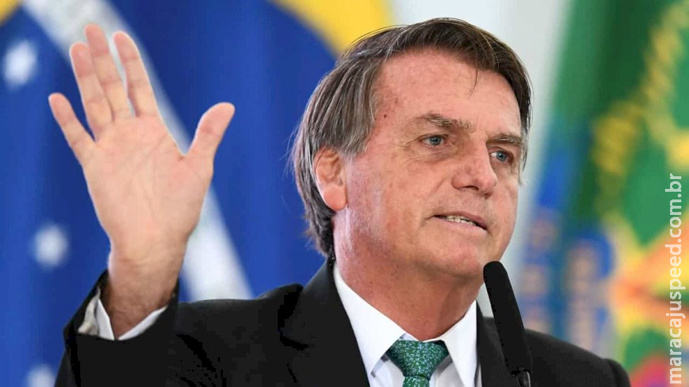 Em tom eleitoral, Bolsonaro ataca Lula para defender armamento civil Em tom eleitoral, Bolsonaro ataca Lula para defender armamento civil