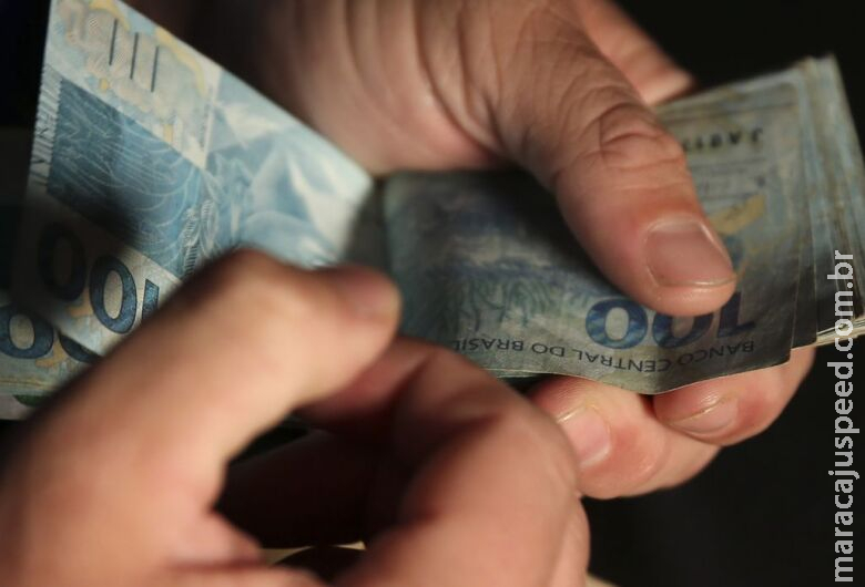 Caixa paga Auxílio Brasil a beneficiários com NIS final zero Caixa paga Auxílio Brasil a beneficiários com NIS final zero