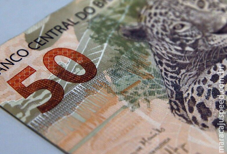 Trabalhadores nascidos em dezembro podem sacar até R$ 1 mil no FGTS Trabalhadores nascidos em dezembro podem sacar até R$ 1 mil no FGTS
