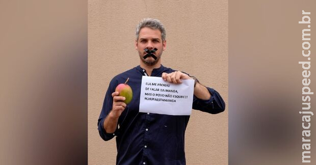 Após ser proibido pela Justiça candidato petista faz protesto silencioso com manga em MS Após ser proibido pela Justiça candidato petista faz protesto silencioso com manga em MS