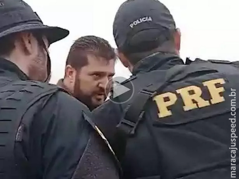 Advogado é preso após tentar furar bloqueio e atirar contra manifestantes Advogado é preso após tentar furar bloqueio e atirar contra manifestantes