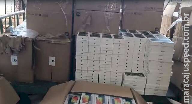 Em meio a sacas de milho, carga milionária de iPhones seria levada para SP Em meio a sacas de milho, carga milionária de iPhones seria levada para SP