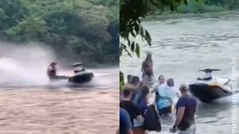 Piloto vai fazer manobra com jet ski, cai na água e quase acerta banhistas em Coxim Piloto vai fazer manobra com jet ski, cai na água e quase acerta banhistas em Coxim