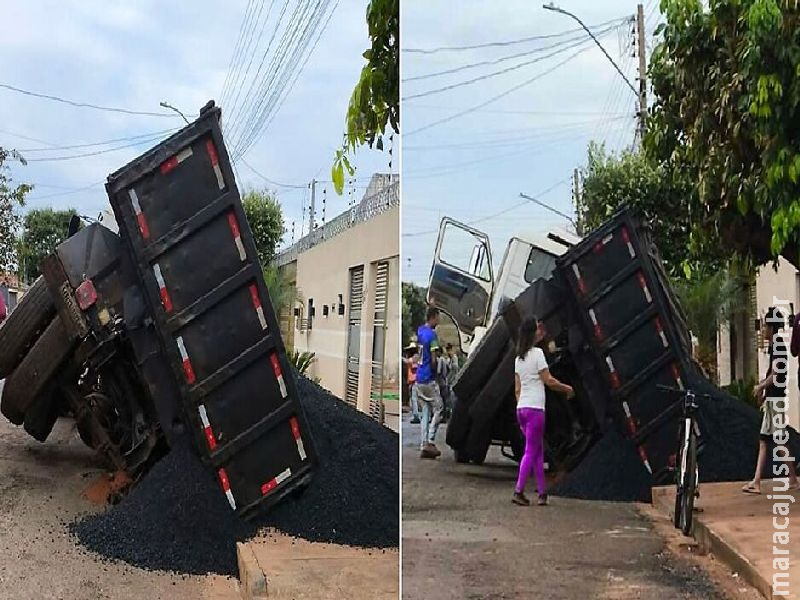 Caminhão com material de recapeamento tomba em Paranaíba Caminhão com material de recapeamento tomba em Paranaíba