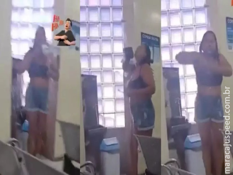 Sem água em casa, mulher toma banho com água de bebedouro de posto da Copasa Sem água em casa, mulher toma banho com água de bebedouro de posto da Copasa